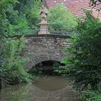 1200px-Teilbogen_der_Wernbrücke_D-6-77-114-176_(Gänheim)_im_August_2020.jpg